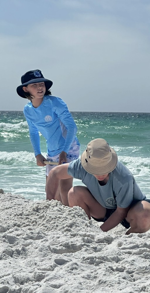 Jack R. Hubbard and Jeffrey R. Hubbard II playing in the surf on a Florida beach.